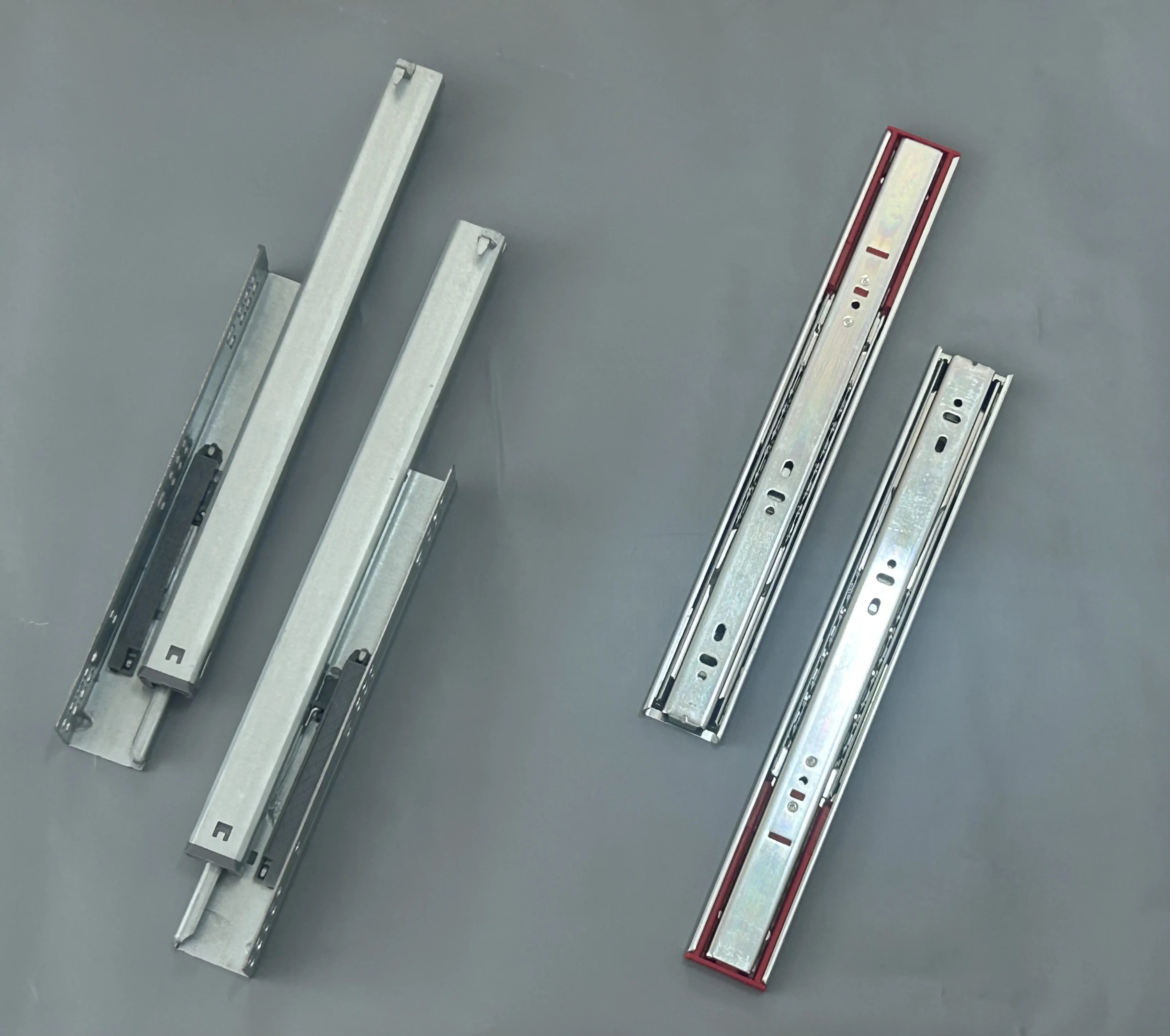 Side-mount ball bearing slides and undermount concealed slides