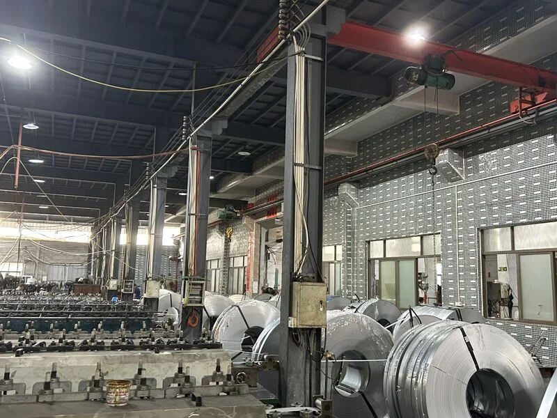 Factory floor with steel coils for the LinkedIn featured post